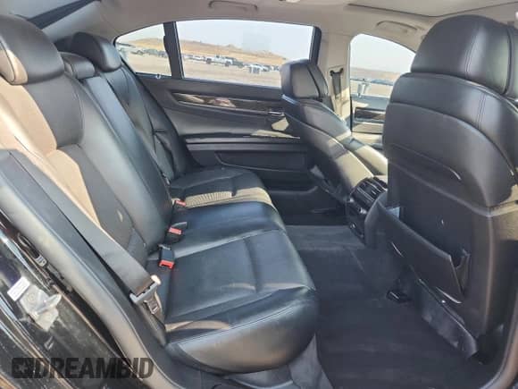 2012 BMW 7 Series 750Li с VIN WBAKB8C50CC965319, выставлен на аукционе Copart как лот 70763565 с пробегом 94 118 миль миль и Чистый • Clean title. История ставок и продаж доступна на DreamBid. Изображение 10.