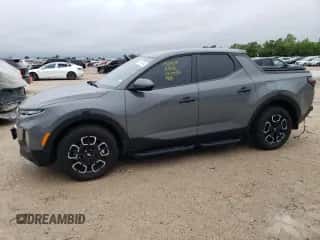 2022 Hyundai Santa Cruz SEL z VIN 5NTJBDAE3NH024871, wystawiony jako Copart lot #47496243 z przebiegiem 6 034 mil mil oraz . Historia ofert i sprzedaży dostępna na DreamBid. Obrazek 1.