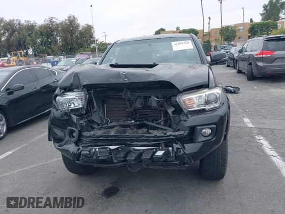 2017 Toyota Tacoma SR5 with VIN 3TMAZ5CN4HM047698, listed as a IAAI auction lot 42465382 with 132,297 mi miles and . Bid and sale history available at DreamBid. Image 13.
