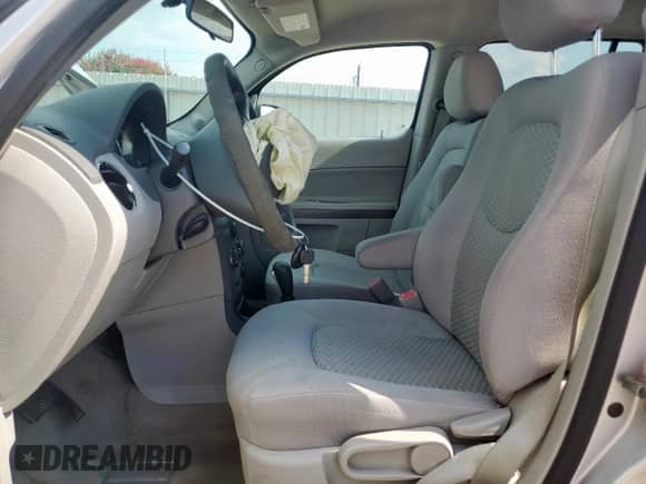 2010 Chevrolet HHR LS with VIN 3GNBAADB2AS505336, listed as a Copart auction lot 71270535 with 128,208 mi miles and Salvage title. Bid and sale history available at DreamBid. Image 7.