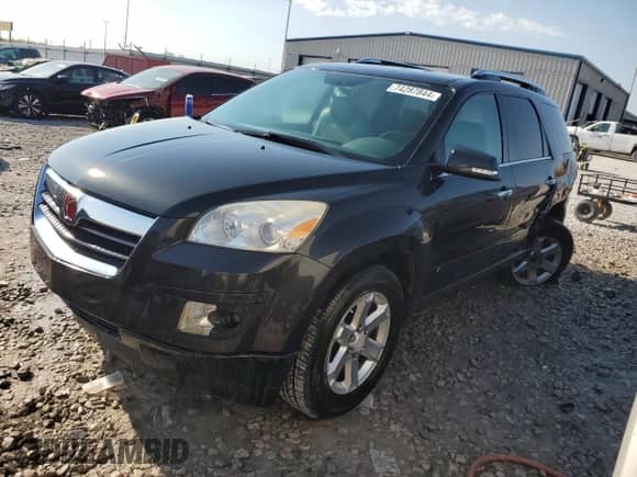 2007 Saturn Outlook XR with VIN 5GZEV23797J112648, listed as a Copart auction lot 74287844 with 178,207 mi miles and Salvage title. Bid and sale history available at DreamBid. Image 1.