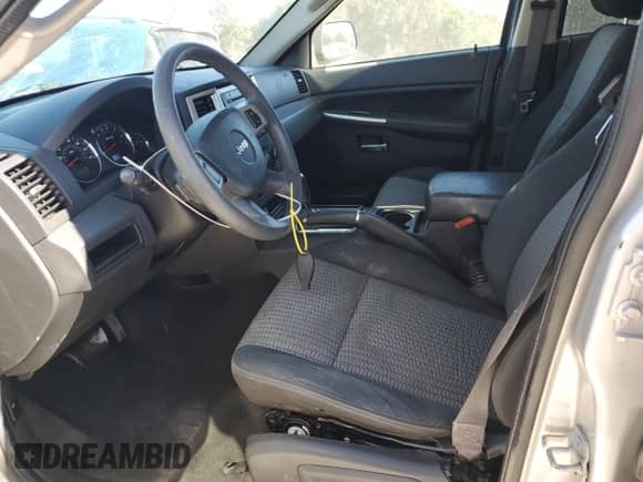 2009 Jeep Grand Cherokee Rocky Mountain с VIN 1J8GR48K69C527904, выставлен на аукционе Copart как лот 82417995 с пробегом 149 691 миль миль и Списание • Salvage title. История ставок и продаж доступна на DreamBid. Изображение 7.