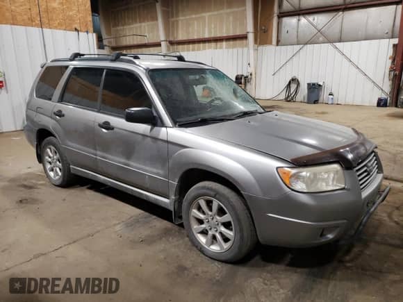 2007 Subaru Forester Special Sports X with VIN JF1SG63697H707395, listed as a Copart auction lot 83835865 with 211,154 mi miles and Salvage title. Bid and sale history available at DreamBid. Image 4.