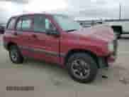 2000 Chevrolet Tracker z VIN 2CNBJ13C5Y6901896, wystawiony jako Copart lot #49317125 z przebiegiem 233 308 mil mil oraz Szkoda całkowita • Salvage title. Historia ofert i sprzedaży dostępna na DreamBid. Obrazek 4.
