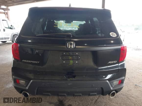 2023 Honda Passport EX-L with VIN 5FNYF8H52PB033173, listed as a IAAI auction lot 42376245 with 24,134 mi miles and . Bid and sale history available at DreamBid. Image 16.