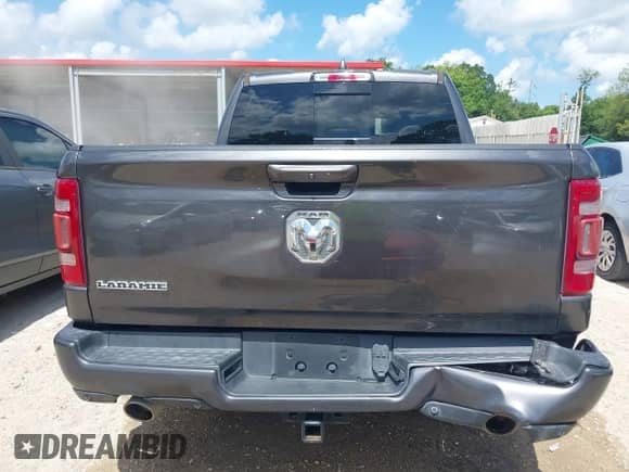2019 Ram 1500 Laramie with VIN 1C6RREJT9KN740596, listed as a IAAI auction lot 42569812 with 60,265 mi miles and . Bid and sale history available at DreamBid. Image 16.