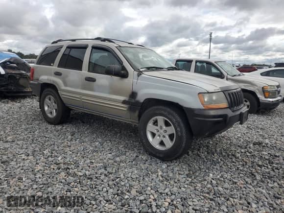 2004 Jeep Grand Cherokee Laredo with VIN 1J4GX48S04C301566, listed as a Copart auction lot 86159575 with 195,483 mi miles and Salvage title. Bid and sale history available at DreamBid. Image 4.