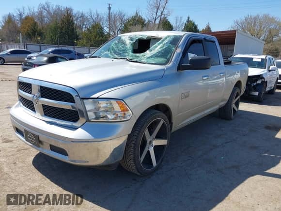 2018 Ram 1500 SLT with VIN 1C6RR6GG7JS303857, listed as a IAAI auction lot 41779748 with 153,289 mi miles and . Bid and sale history available at DreamBid. Image 2.