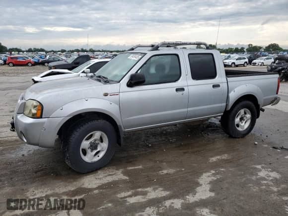 2002 Nissan Frontier SVE с VIN 1N6MD27YX2C370951, выставлен на аукционе Copart как лот 59499485 с пробегом 180 444 миль миль и Списание • Salvage title. История ставок и продаж доступна на DreamBid. Изображение 1.