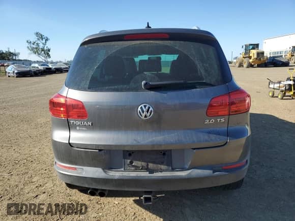 2014 Volkswagen Tiguan SEL z VIN WVGAV3AX0EW555873, wystawiony jako Copart lot #55695955 z przebiegiem 69 984 mil mil oraz Szkoda całkowita • Salvage title. Historia ofert i sprzedaży dostępna na DreamBid. Obrazek 6.