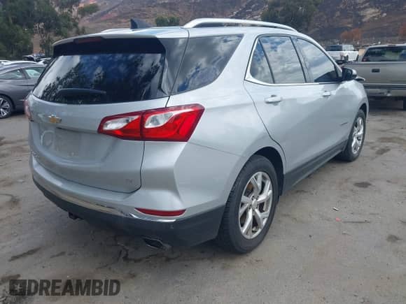 2018 Chevrolet Equinox LT z VIN 2GNAXKEX2J6155117, wystawiony jako IAAI lot #43252814 z przebiegiem 115 406 mil mil oraz . Historia ofert i sprzedaży dostępna na DreamBid. Obrazek 4.