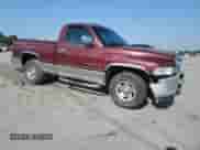 2001 Dodge 1500 Work Special with VIN 1B7HC16X61S141388, listed as a Copart auction lot 66594195 with 125,850 mi miles and Salvage title. Bid and sale history available at DreamBid. Image 4.