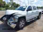 2014 Chevrolet Silverado 1500 LT z VIN 3GCUKREC6EG165041, wystawiony jako IAAI lot #42588499 z przebiegiem 189 554 mil mil oraz . Historia ofert i sprzedaży dostępna na DreamBid. Obrazek 17.
