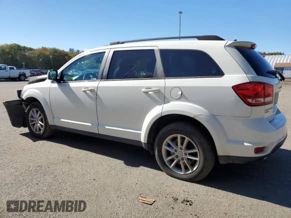 2015 Dodge Journey SXT with VIN 3C4PDDBG3FT613276, listed as a Copart auction lot 85899795 with 151,311 mi miles and Salvage title. Bid and sale history available at DreamBid. Image 2.