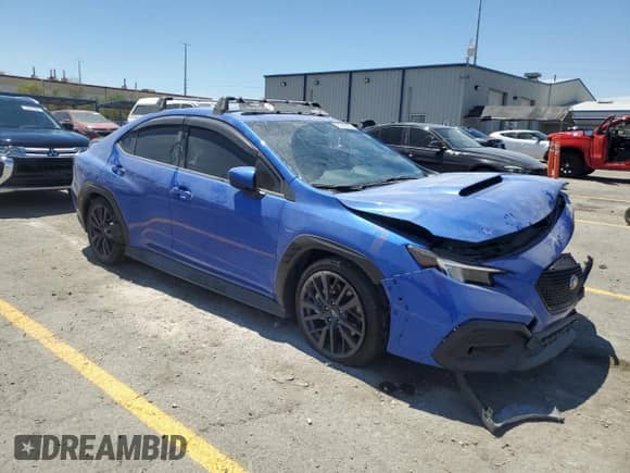 2023 Subaru WRX Premium with VIN JF1VBAF67P9817432, listed as a Copart auction lot 67545365 with 26,574 mi miles and Salvage title. Bid and sale history available at DreamBid. Image 4.