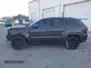 2021 Jeep Grand Cherokee Laredo E with VIN 1C4RJEAG3MC681031, listed as a IAAI auction lot 40734451 with 47,147 mi miles and . Bid and sale history available at DreamBid. Image 13.