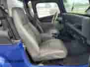 1990 Jeep Wrangler z VIN 2J4FY39T8LJ519849, wystawiony jako Copart lot #50917265 z przebiegiem 153 966 mil mil oraz Czysty tytuł • Clean title. Historia ofert i sprzedaży dostępna na DreamBid. Obrazek 11.