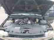 2002 Chevrolet Silverado 2500HD LS z VIN 1GCHK29132E156611, wystawiony jako IAAI lot #42227369 z przebiegiem 342 075 mil mil oraz . Historia ofert i sprzedaży dostępna na DreamBid. Obrazek 17.