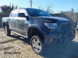 2013 Toyota Tundra with VIN 5TFDY5F15DX306843, listed as a IAAI auction lot 41586329 with 75,949 mi miles and . Bid and sale history available at DreamBid. Image 1.
