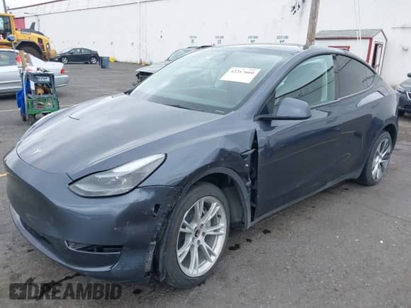 2023 Tesla Model Y Long Range with VIN 7SAYGDEE4PF806349, listed as a IAAI auction lot 42217660 with 39,898 mi miles and . Bid and sale history available at DreamBid. Image 6.