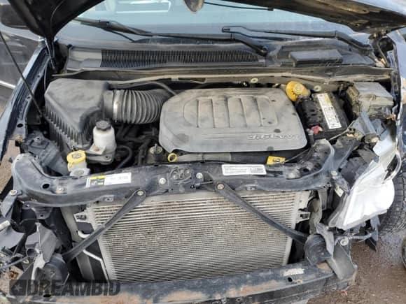 2014 Dodge Grand Caravan Crew z VIN 2C4RDGDGXER375810, wystawiony jako Copart lot #43186295 z przebiegiem 173 172 mil mil oraz Czysty tytuł • Clean title. Historia ofert i sprzedaży dostępna na DreamBid. Obrazek 12.