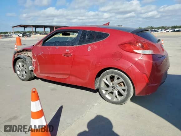 2016 Hyundai Veloster with VIN KMHTC6AD4GU284031, listed as a Copart auction lot 82049985 with 127,545 mi miles and Salvage title. Bid and sale history available at DreamBid. Image 2.
