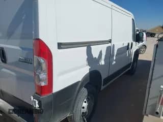 2023 Ram ProMaster Cargo z VIN 3C6LRVVG4PE584448, wystawiony jako IAAI lot #41582170 z przebiegiem 87 666 mil mil oraz . Historia ofert i sprzedaży dostępna na DreamBid. Obrazek 1.