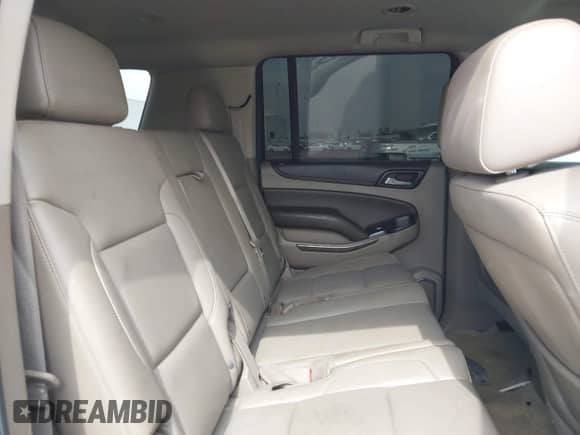 2015 Chevrolet Suburban LT z VIN 1GNSCJKCXFR700715, wystawiony jako IAAI lot #42748716 z przebiegiem 169 082 mil mil oraz . Historia ofert i sprzedaży dostępna na DreamBid. Obrazek 8.