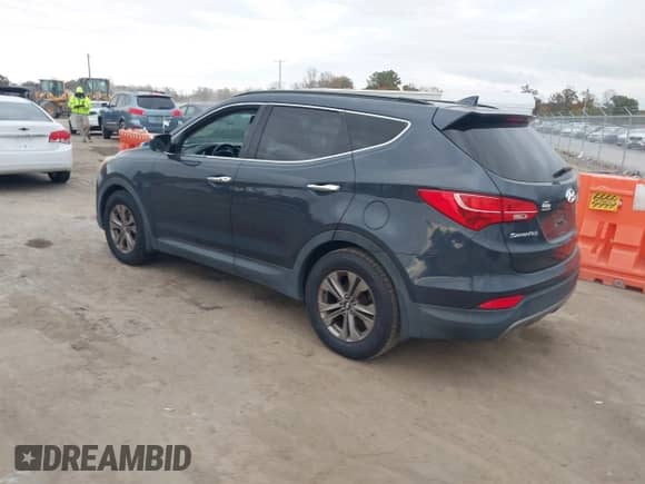 2016 Hyundai Santa Fe with VIN 5XYZU3LB4GG341299, listed as a IAAI auction lot 43574627 with 153,986 mi miles and . Bid and sale history available at DreamBid. Image 3.