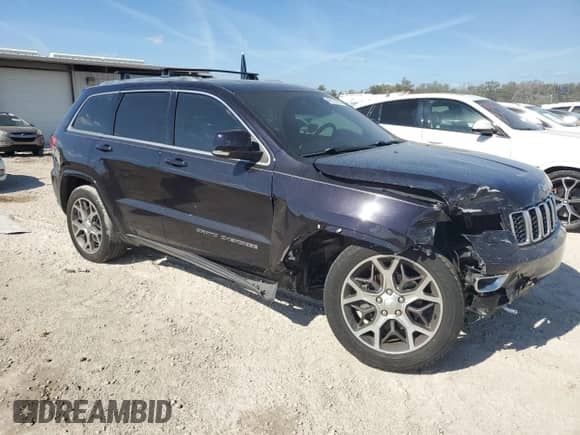 2018 Jeep Grand Cherokee Sterling with VIN 1C4RJEBG4JC304749, listed as a Copart auction lot 45123195 with 69,137 mi miles and Salvage title. Bid and sale history available at DreamBid. Image 4.