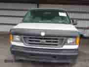 2004 Ford Econoline Cargo with VIN 1FTNE24L74HA02018, listed as a IAAI auction lot 43457126 with 240,654 mi miles and . Bid and sale history available at DreamBid. Image 12.