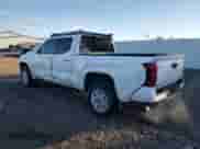 2024 Toyota Tacoma SR5 with VIN 3TYLB5JN6RT040080, listed as a Copart auction lot 86147085 with 7,596 mi miles and Salvage title. Bid and sale history available at DreamBid. Image 2.