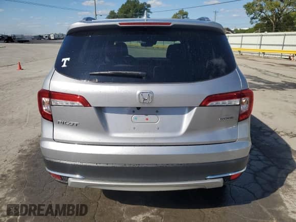 2022 Honda Pilot Touring 7-Passenger with VIN 5FNYF5H6XNB017260, listed as a Copart auction lot 70459955 with 47,527 mi miles and Salvage title. Bid and sale history available at DreamBid. Image 6.
