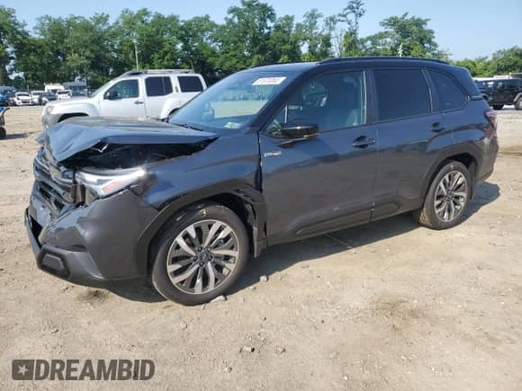 2025 Subaru Forester Touring Hybrid with VIN JF2SLSTD8SH401537, listed as a Copart auction lot 61878365 with 878 mi miles and Salvage title. Bid and sale history available at DreamBid. Image 1.