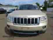 2011 Jeep Grand Cherokee 70th Anniversary with VIN 1J4RR4GGXBC563334, listed as a Copart auction lot 71876355 with 104,989 mi miles and Clean title. Bid and sale history available at DreamBid. Image 5.