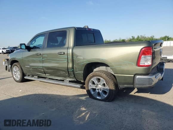 2021 Ram 1500 Big Horn with VIN 1C6RREFM8MN630286, listed as a Copart auction lot 52309255 with 101,138 mi miles and Salvage title. Bid and sale history available at DreamBid. Image 2.