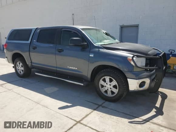 2007 Toyota Tundra SR5 z VIN 5TBET541X7S454852, wystawiony jako Copart lot #61135375 z przebiegiem Nie podano mil oraz Szkoda całkowita • Salvage title. Historia ofert i sprzedaży dostępna na DreamBid. Obrazek 4.