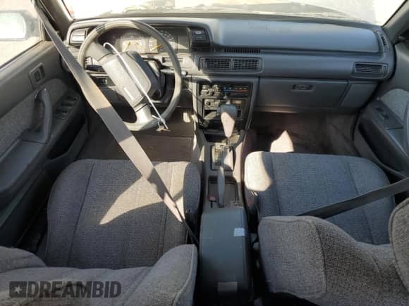 1990 Toyota Camry z VIN JT2SV21W7L0364695, wystawiony jako Copart lot #68265625 z przebiegiem 262 028 mil mil oraz Szkoda całkowita • Salvage title. Historia ofert i sprzedaży dostępna na DreamBid. Obrazek 15.