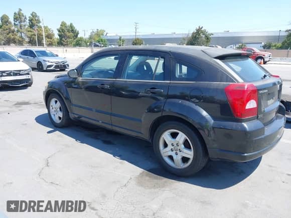 2009 Dodge Caliber SXT with VIN 1B3HB48C29D187901, listed as a IAAI auction lot 42727025 with 112,799 mi miles and . Bid and sale history available at DreamBid. Image 3.
