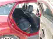 2014 Ford Focus Titanium z VIN 1FADP3N28EL431061, wystawiony jako IAAI lot #43187384 z przebiegiem 121 014 mil mil oraz . Historia ofert i sprzedaży dostępna na DreamBid. Obrazek 8.