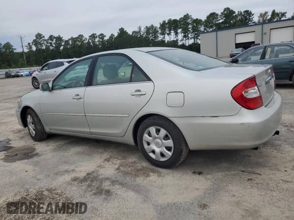 2004 Toyota Camry LE z VIN 4T1BE32K24U816888, wystawiony jako Copart lot #70691535 z przebiegiem 194 215 mil mil oraz Szkoda całkowita • Salvage title. Historia ofert i sprzedaży dostępna na DreamBid. Obrazek 2.