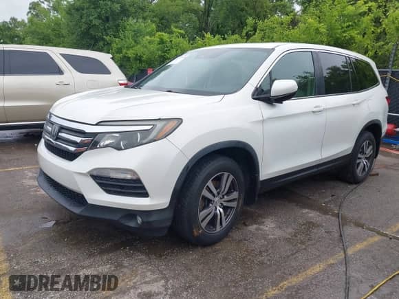 2016 Honda Pilot EX-L with VIN 5FNYF6H63GB072979, listed as a IAAI auction lot 42297910 with 155,869 mi miles and . Bid and sale history available at DreamBid. Image 2.