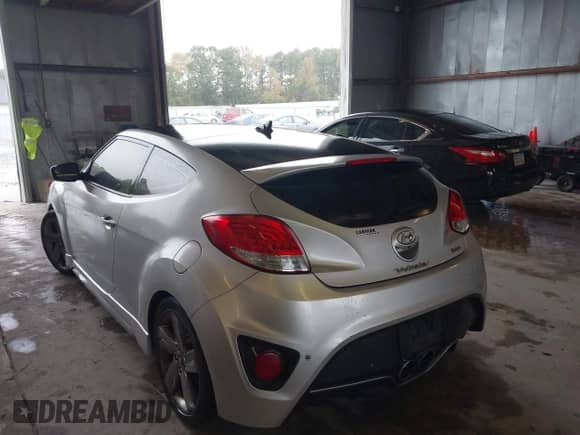 2013 Hyundai Veloster Turbo с VIN KMHTC6AE6DU079671, выставлен на аукционе IAAI как лот 43577765 с пробегом 139 477 миль миль и . История ставок и продаж доступна на DreamBid. Изображение 3.