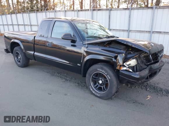 2002 Dodge Dakota SLT with VIN 1B7GL42X92S524987, listed as a IAAI auction lot 41116288 with 221,640 mi miles and . Bid and sale history available at DreamBid. Image 1.