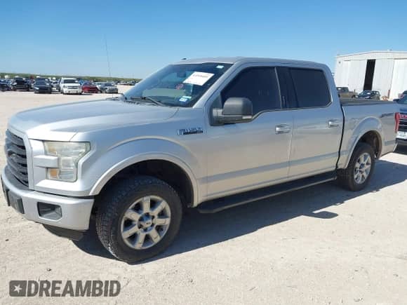 2015 Ford F-150 XL with VIN 1FTEW1CF8FKD20433, listed as a IAAI auction lot 43518401 with 176,409 mi miles and . Bid and sale history available at DreamBid. Image 2.
