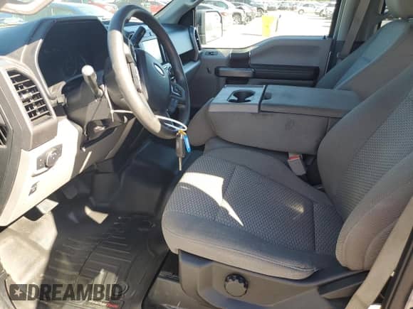 2019 Ford F-150 XLT z VIN 1FTEW1E49KKD00598, wystawiony jako Copart lot #86784195 z przebiegiem 214 239 mil mil oraz Czysty tytuł • Clean title. Historia ofert i sprzedaży dostępna na DreamBid. Obrazek 7.