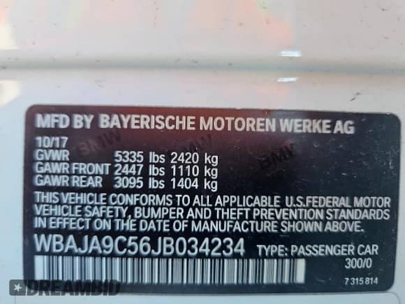 2018 BMW 5 Series 530e with VIN WBAJA9C56JB034234, listed as a Copart auction lot 71633935 with 129,136 mi miles and Clean title. Bid and sale history available at DreamBid. Image 12.