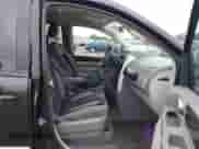 2010 Dodge Grand Caravan SXT with VIN 2D4RN5D19AR215735, listed as a IAAI auction lot 43195516 with 182,315 mi miles and . Bid and sale history available at DreamBid. Image 5.