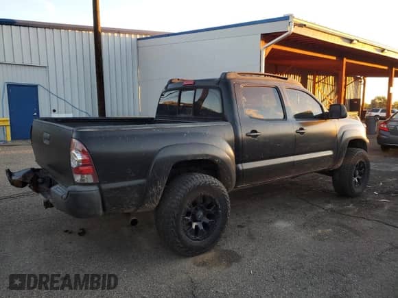 2013 Toyota Tacoma с VIN 3TMLU4EN4DM131433, выставлен на аукционе Copart как лот 85946955 с пробегом 119 482 миль миль и Списание • Salvage title. История ставок и продаж доступна на DreamBid. Изображение 3.
