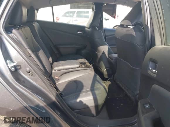 2018 Toyota Prius Plus z VIN JTDKARFP2J3072803, wystawiony jako IAAI lot #42443376 z przebiegiem 120 009 mil mil oraz . Historia ofert i sprzedaży dostępna na DreamBid. Obrazek 8.